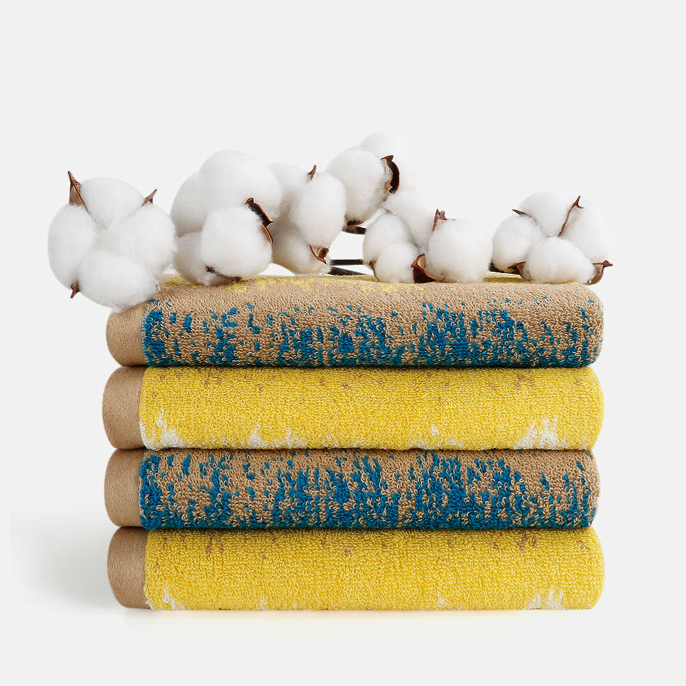 Dive into the soothing blues and sunny yellows of the SEMAXE Beach Hand Towel Set, featuring four premium hand towels (70x40 cm each). Crafted from superior 100% cotton, these towels offer exceptional absorbency and plush comfort. Inspired by the refreshing hues of the seashore, this set captures the essence of ocean waves and sandy beaches, making every day feel like a serene beach getaway. Ideal for adding a splash of color and coastal flair to your home.