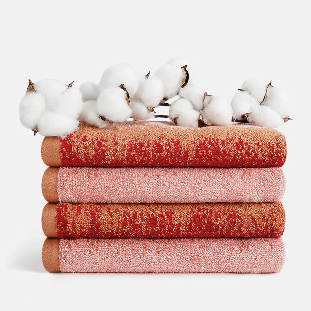 Experience the rich tapestry of the SEMAXE Plum Garden Hand Towel Set, which includes four exquisitely designed hand towels (70x40 cm each). Made from luxurious 100% cotton, these towels boast exceptional absorbency and softness. The set features a blend of warm, earthy tones and deep reds, evoking the serene beauty of a plum garden at dusk. Perfect for adding a touch of elegance and warmth to any bathroom setting.