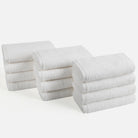 Includes 12 hand towels, each 40cm x 70cm. Classic white towels are a bathroom staple, known for their versatility and clean appearance.
