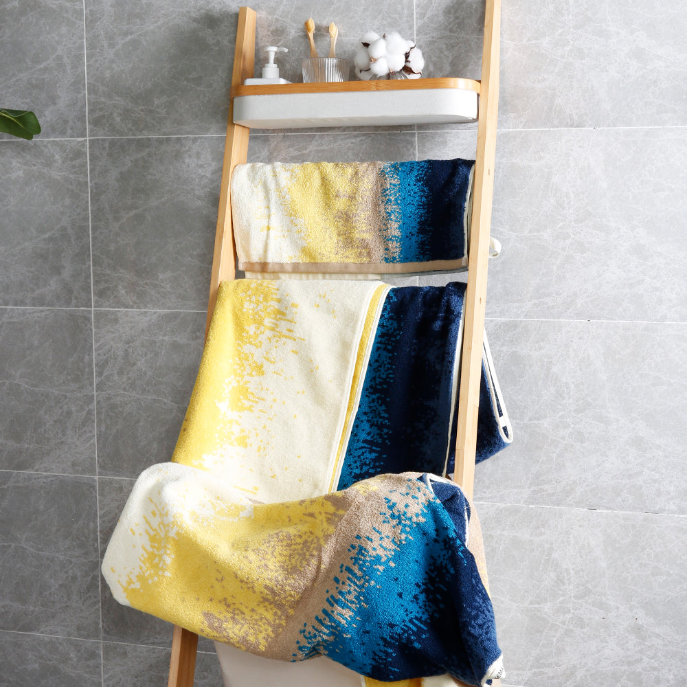 The beach towel set is folded and hung on a shelf, with rich and bright patterns