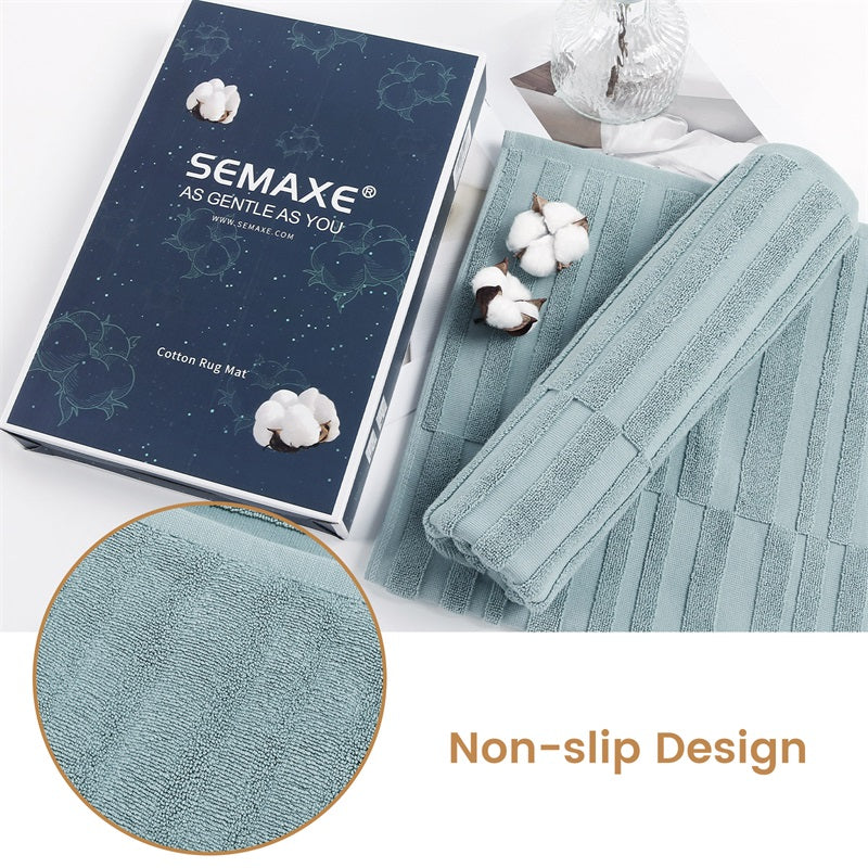 Unbox elegance with SEMAXE’s blue non-slip bath mat, presented in a stylish gift box adorned with cotton motifs. The mat's unique texture and safety design promise a blend of luxury and practicality, perfect for enhancing any bathroom's decor.