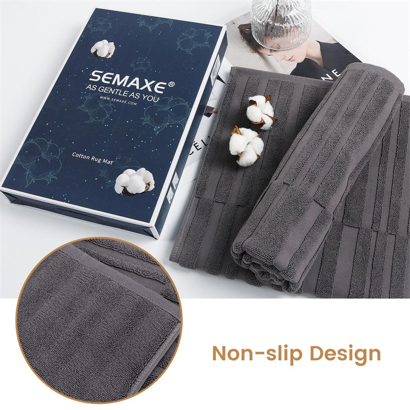 Unveil the elegance of SEMAXE's grey bath mat, presented in a sophisticated gift box, featuring a non-slip design that ensures safety and style. Each mat is crafted with the promise of comfort and durability, making it an ideal gift or a perfect addition to any modern bathroom