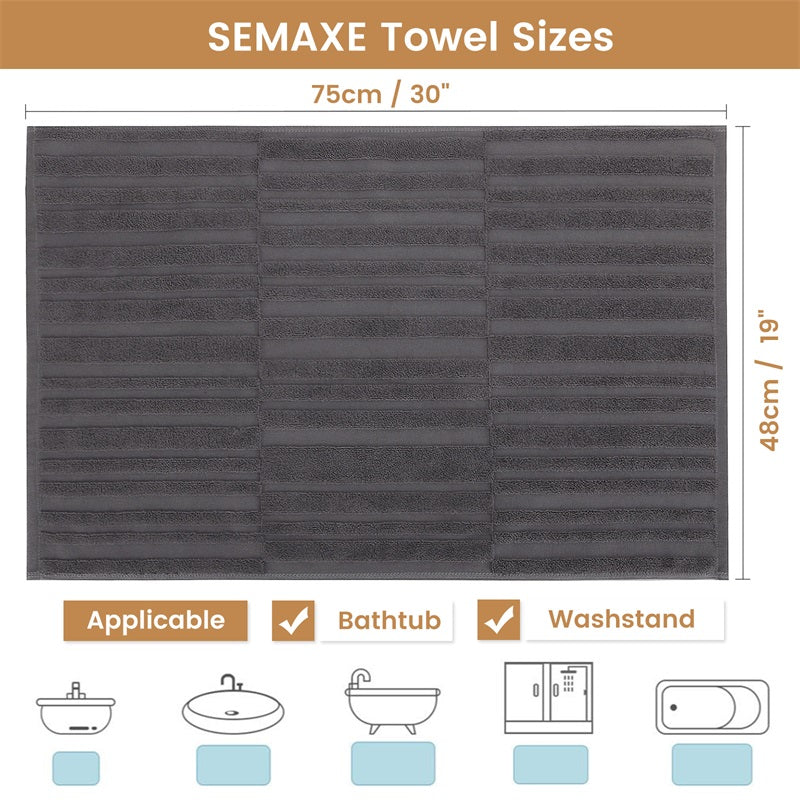 Find the perfect fit for every corner of your home with SEMAXE's grey bath mat, measured at 80 cm by 50 cm. Ideal for versatile placements, from beside your bathtub to under a washstand, this mat enhances both functionality and decor in any setting.