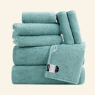 An aqua blue 8-piece towel set that looks like clear sea water