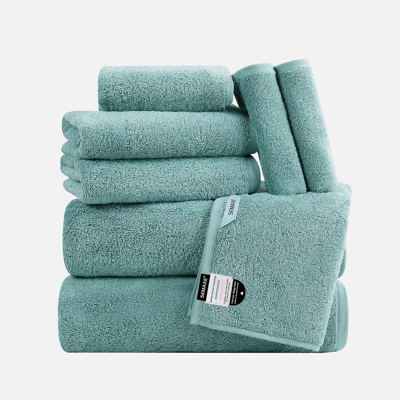 An aqua blue 8-piece towel set that looks like clear sea water