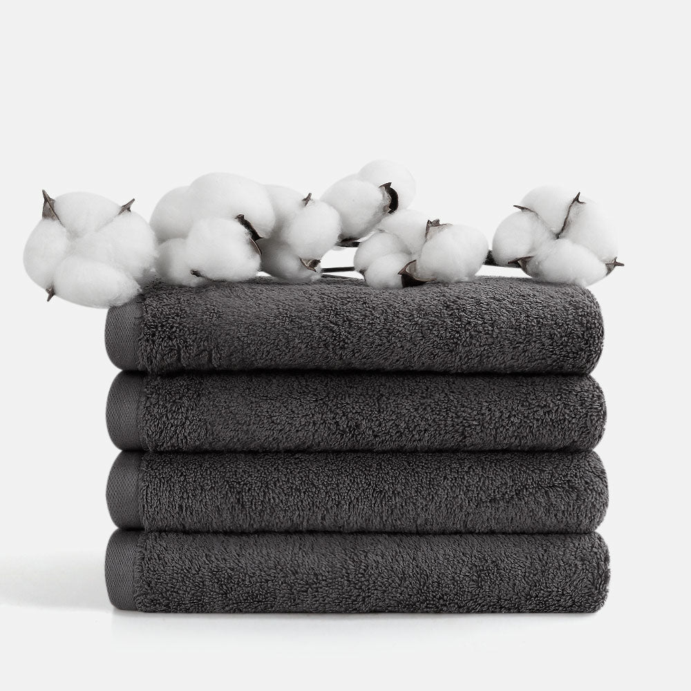 Elegant gray hand towel set by SEMAXE, 4 pieces, size 40cm x 70cm, offers luxury and functionality with its soft, absorbent cotton.