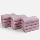  Contains 12 hand towels, each 40cm x 70cm. Soft pink towels offer a gentle color that complements a light, airy bathroom theme.