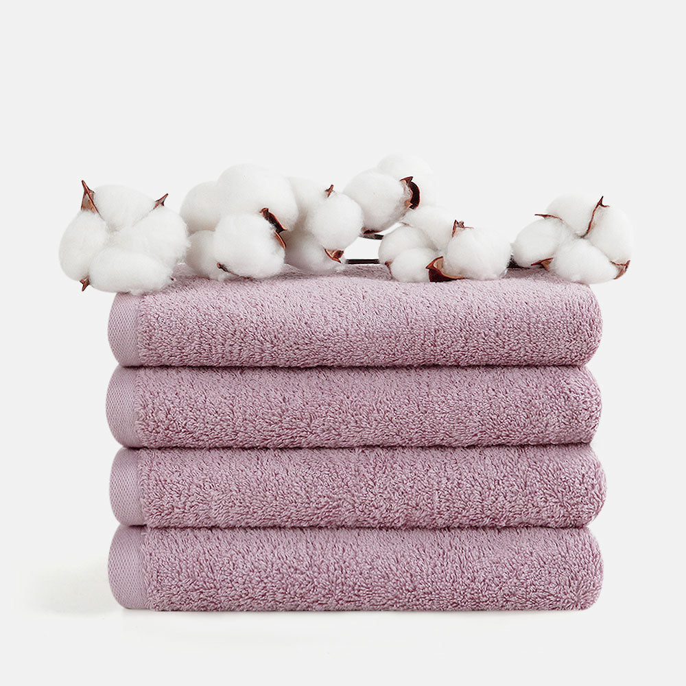 Chic pink hand towel set from SEMAXE, comprising 4 towels, each 40cm x 70cm, combines plush texture with effective drying capabilities.