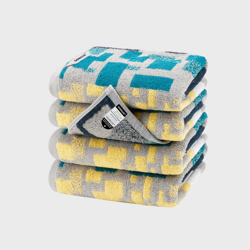 Experience the artistic allure of the SEMAXE Impression Hand Towel Set, featuring four hand towels sized 70x40 cm. These towels are adorned with a minimalist geometric pattern in soothing shades of blue, grey, and yellow, effortlessly adding a touch of modern elegance to any bathroom. Crafted from high-quality cotton, they ensure superior absorbency and softness, perfect for daily use.