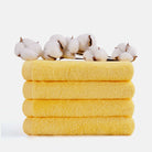 Bright yellow hand towel set by SEMAXE, includes 4 towels, dimensions 40cm x 70cm, made with high-quality cotton for enhanced comfort and durability.